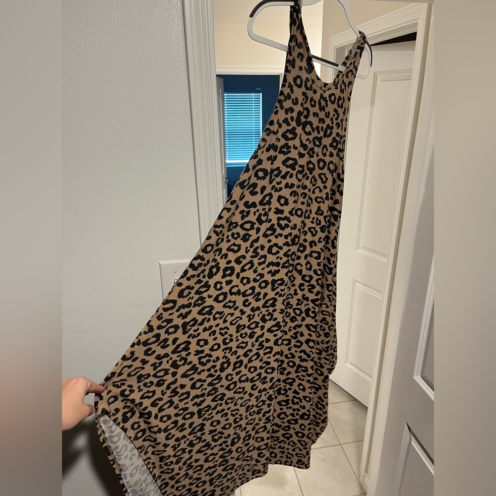 Boutique Cheetah midi dress with scoop hem.
